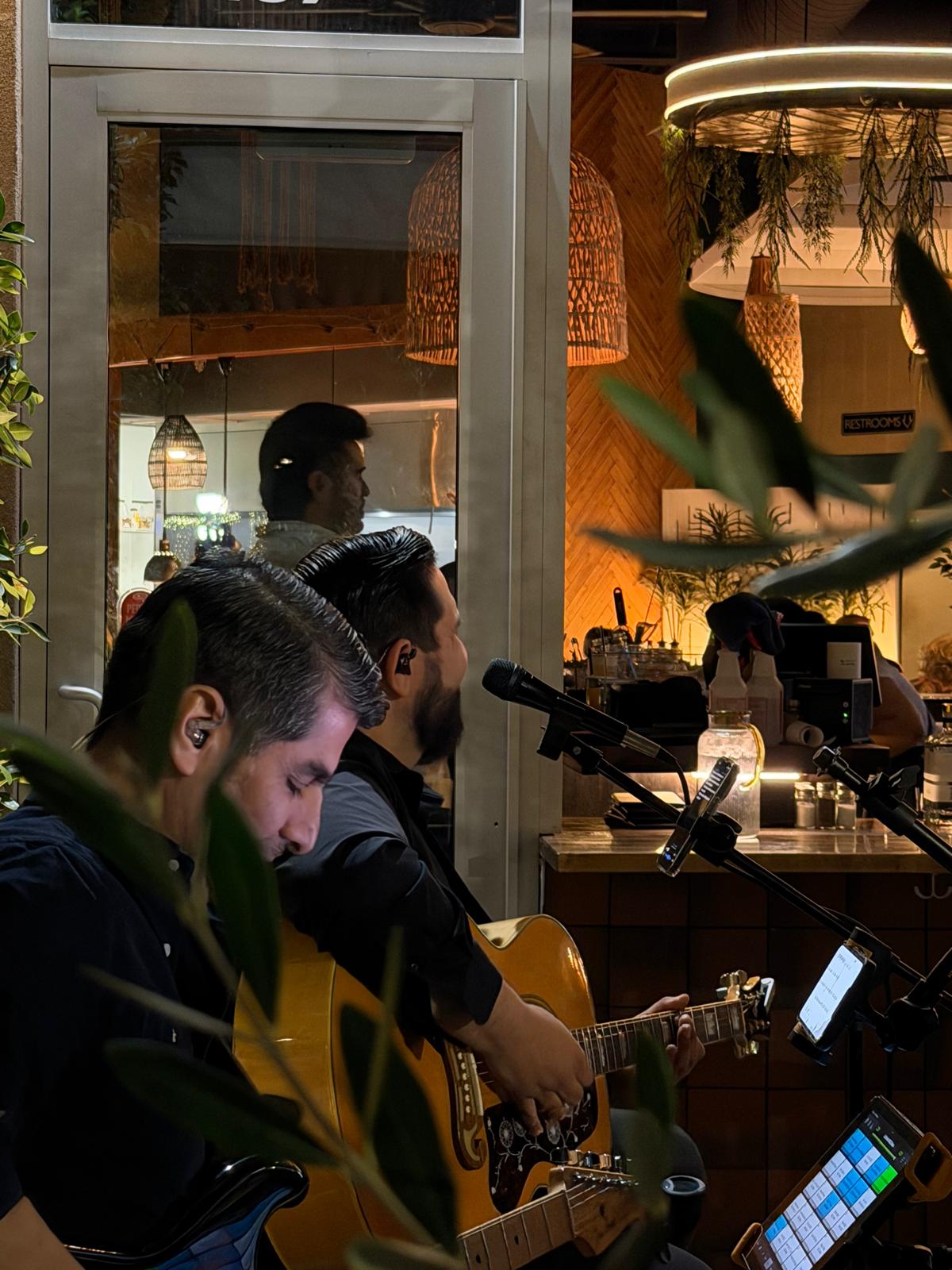 Live musicians performing inside one of our restaurant venues